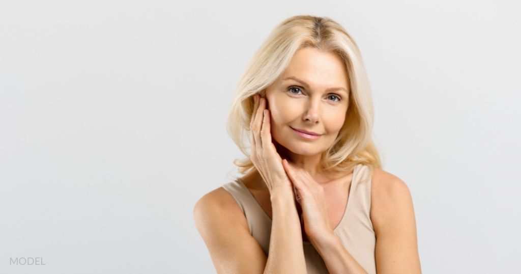 Older woman smiling with smooth skin (model)