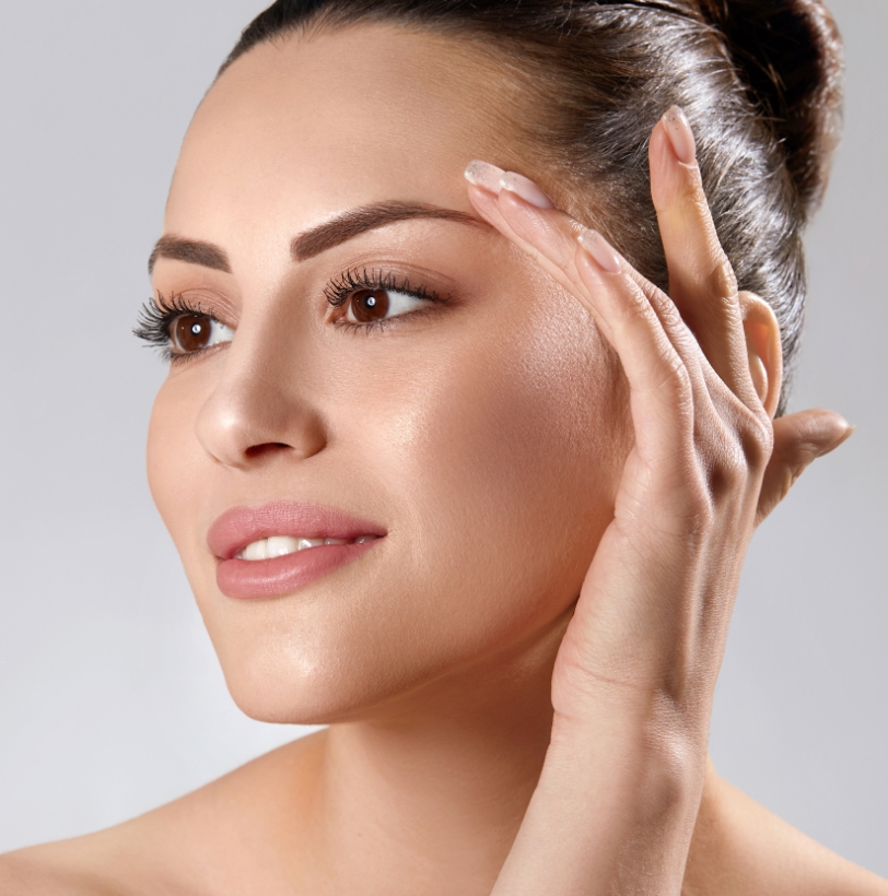 Close-up of a woman’s face showing refreshed, natural-looking skin tone and texture.