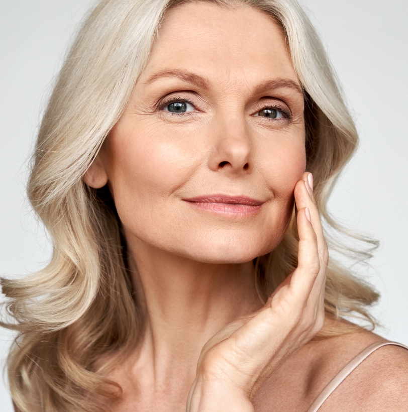 Close-up of a woman’s face showing refreshed, natural-looking skin tone and texture.