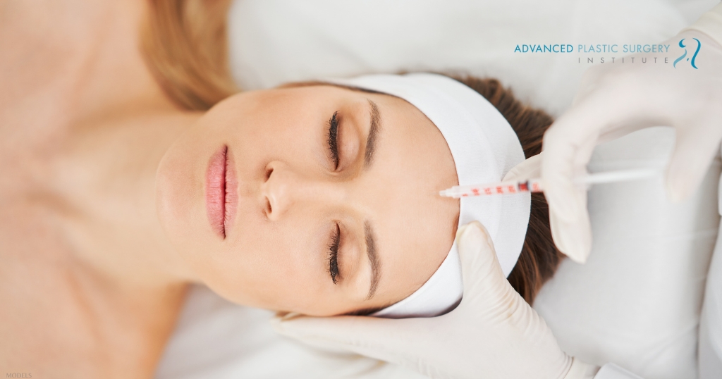 Woman receiving a BOTOX treatment (models)