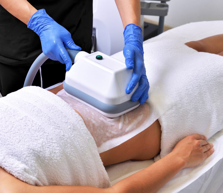 Staff performing a body treatment